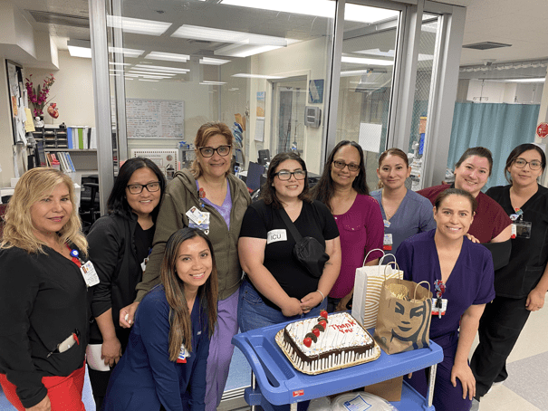 A group of people posing for a photo